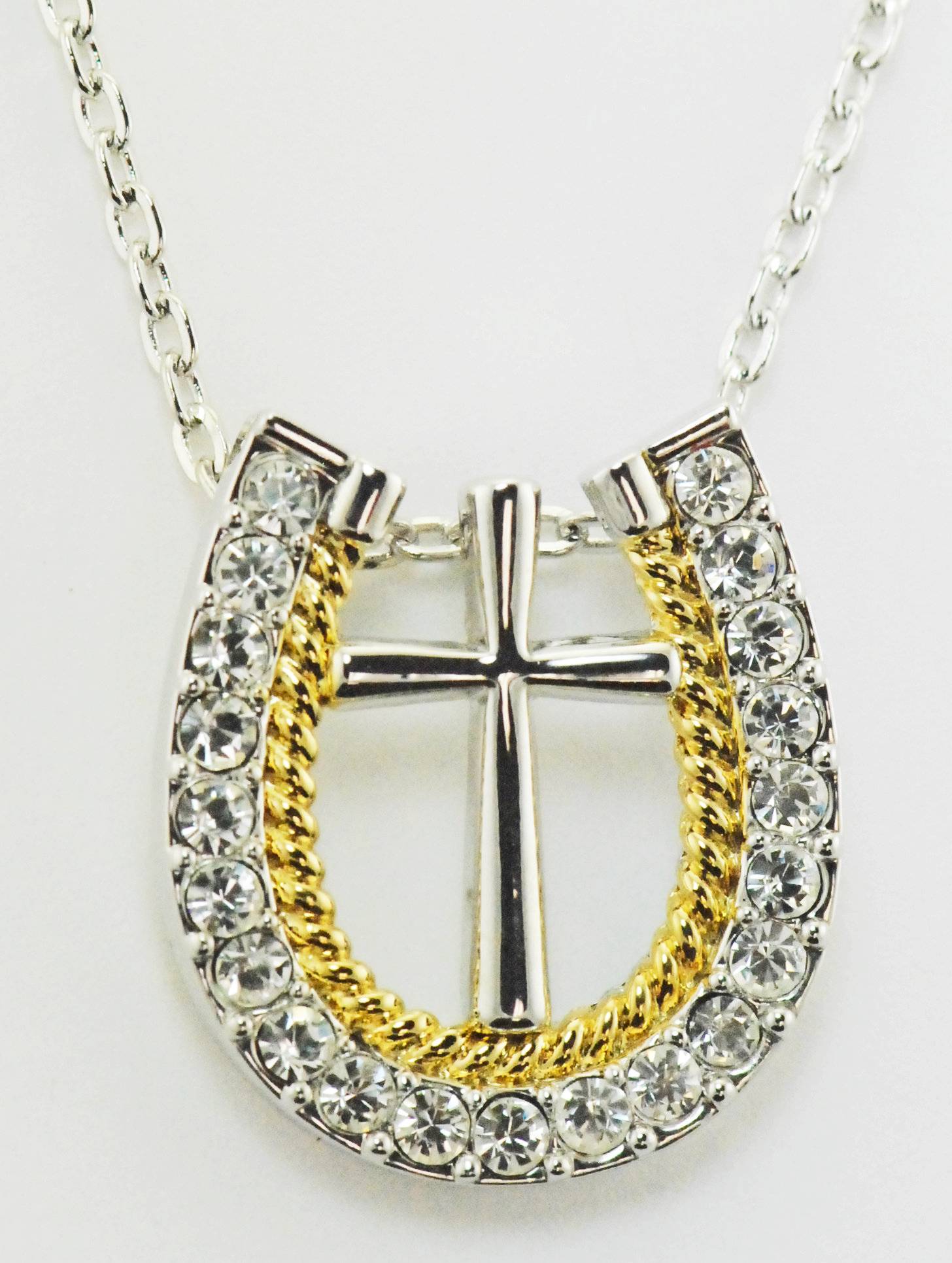 western cross necklace        
        <figure class=